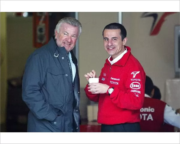 Formula One World Championship: Willi Weber, Michael Schumachers manager, talks with Ange Pasquali Toyota Motorsport Team Manager