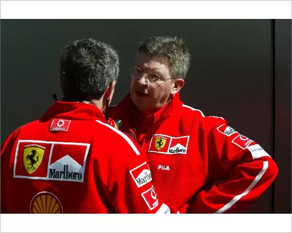 Formula One World Championship: Nigel Stepney and Ross Brawn Ferrari Technical Director chat in the paddock