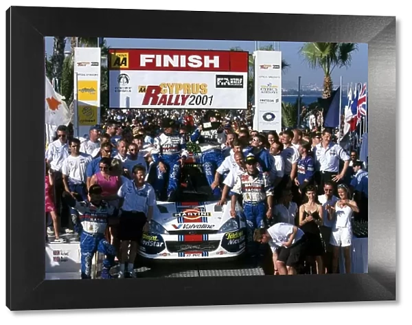 World Rally Championship: Winners Colin McRae and Nicky Grist celebrate with the Ford team