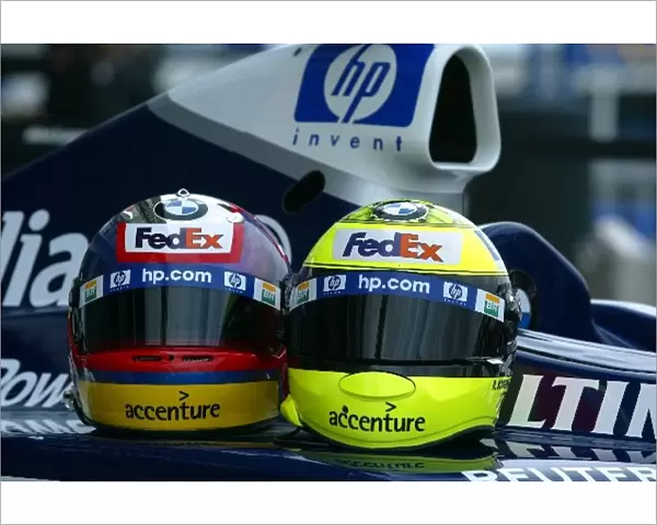 Formula One World Championship: The helmets of Juan Pablo Montoya and his Williams team mate Ralf Schumacher with the new HP liveried Williams FW24