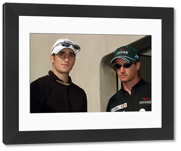 Formula One World Championship: Tomas Scheckter with Eddie Irvine Jaguar