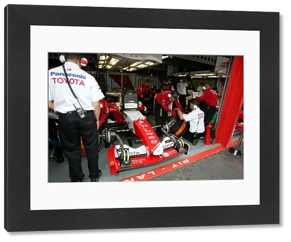 Formula One World Championship: Ryan Briscoe Toyota TF104B in the garage
