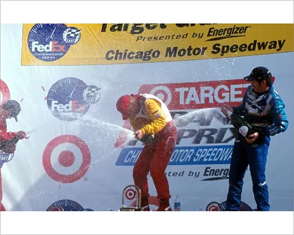 Fedex Cart Championship Series: The podium finishers battle it out with the champagne: Gil de Ferran Penske third; Kenny Brack Team Rahal winner