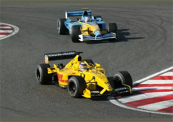 Formula One World Championship: Fifth placed Takuma Sato Jordan Honda EJ12 leads Jarno Trulli Renault R202