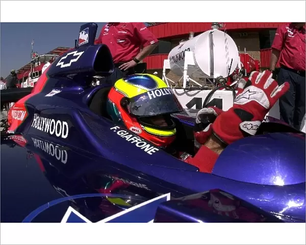Felipe Giaffone, (BRA), puts on his gloves prior to practice for the Yamaha 400