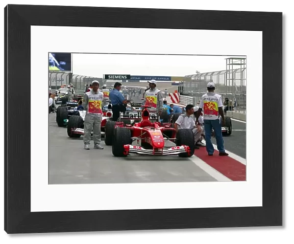 Formula One World Championship: The car of Michael Schumacher Ferrari F2004 in parc ferme