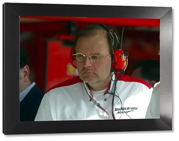 Formula One World Championship: Kees van de Grint Senior Bridgestone Engineer in the Ferrari pit