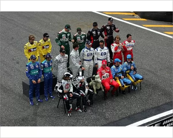 Formula One World Championship: The Jaguar donkey takes the place of Michael Schumacher Ferrari during the end of season driver picture