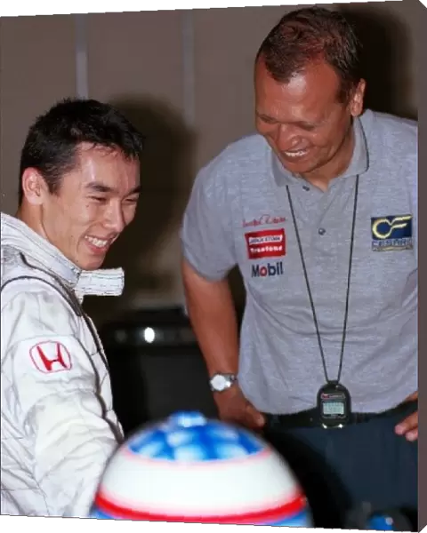 Formula Three Testing: Takuma Sato, left, and Cesario Formula Three team owner Augusto Cesario