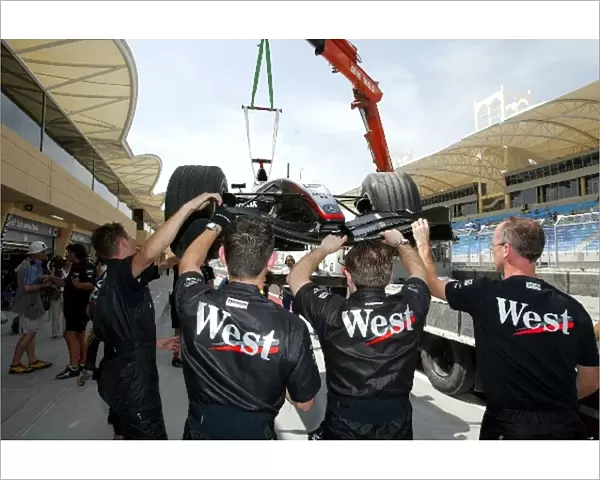 Formula One World Championship: The car of David Coulthard McLaren Mercedes MP4  /  19 is returned to the pits on a truck after suffering a mechanical