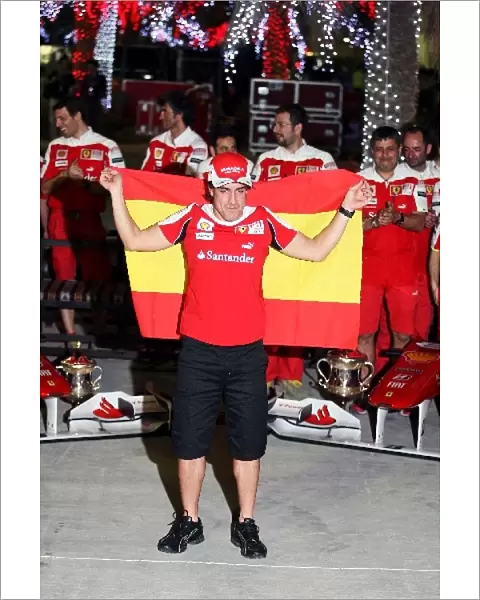 Formula One World Championship: Race winner Fernando Alonso Ferrari F10 celebrates with the team