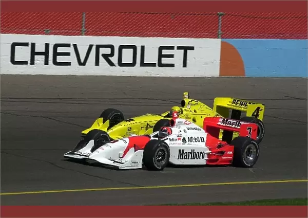 Helio Castroeves, (BRA), and Sam Hornish, (USA), raced their Dallara  /  Chevrolets hard all day long at the Copper World 200. Phoenix, Az. March
