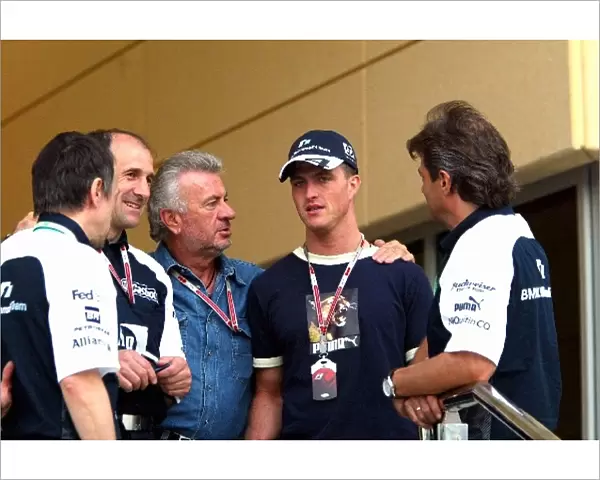 Formula One World Championship: Willi Weber Manager of the Schumacher brothers and Ralf Schumacher Williams in discussion