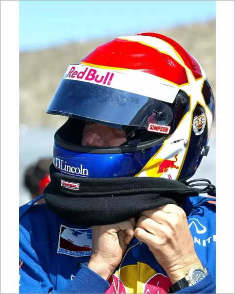 Indy Racing League: Eddie Cheever straps up his helmet for practice at the Copper World 200, Phoenix Intl. Raceway, Phoenix, AZ, 15, March, 2002