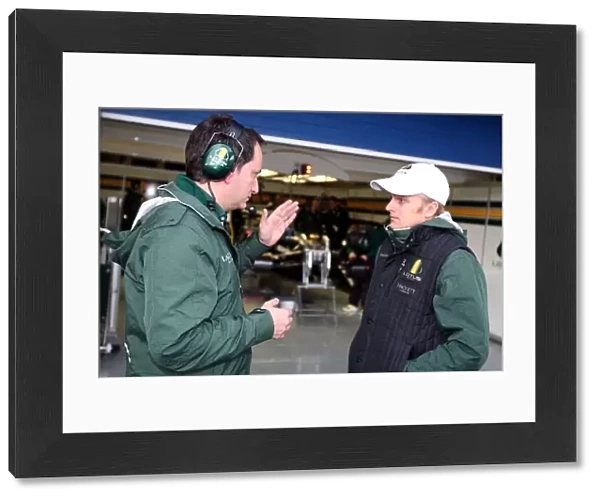 Formula One World Championship: Heikki Kovalainen Lotus talks with Gianluca Pisanello Lotus Race Engineer