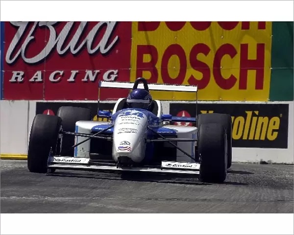 Alex Gurney led a number of laps early on, only to be passed on a restart by eventual winner Michael Valiante at the Chevron Challenge Atlantic race at Long Beach, Ca. Toyota Grand Prix of Long Beach. Long Beach, Ca. 14 April, 2002