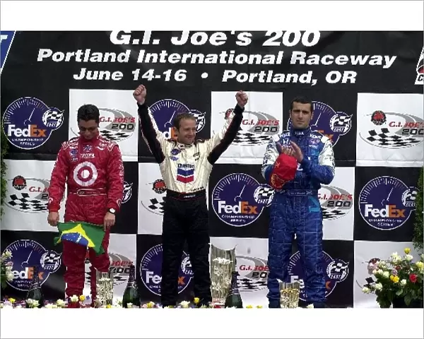 Top three drivers (L-R) Bruno Junqueira (BRA), Cristiano da Matta (BRA) and Dario Franchitti (GBR) celebrate after the G. I. Joes 200 Portland International Raceway, Portland, Oregon, USA 16 June, 2002 DIGITAL