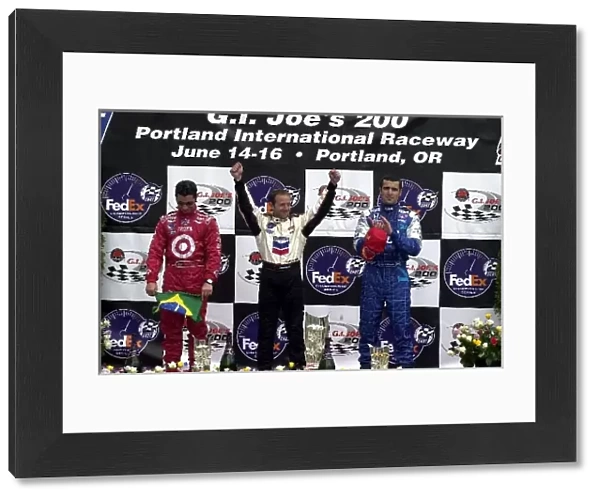 Top three drivers (L-R) Bruno Junqueira (BRA), Cristiano da Matta (BRA) and Dario Franchitti (GBR) celebrate after the G. I. Joes 200 Portland International Raceway, Portland, Oregon, USA 16 June, 2002 DIGITAL