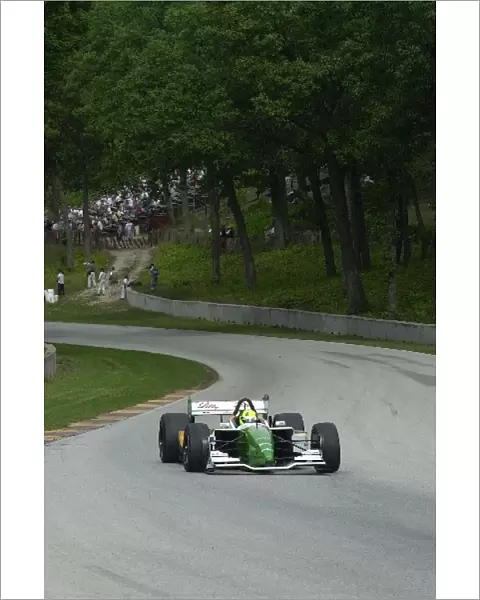 Christian Fittipaldi winds through Thunder Valley at the Motorola 220 at Road America