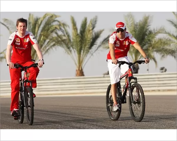Formula One World Championship: Rob Smedley Ferrari Race Engineer and Felipe Massa Ferrari cycle the circuit