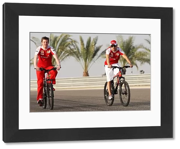 Formula One World Championship: Rob Smedley Ferrari Race Engineer and Felipe Massa Ferrari cycle the circuit