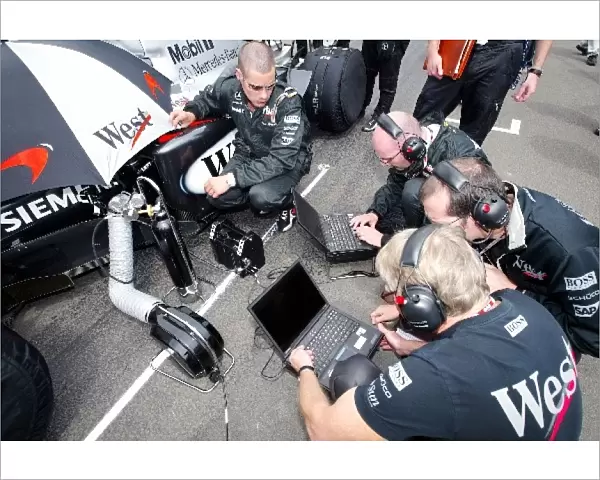 Formula One World Championship: McLaren engineers on the grid