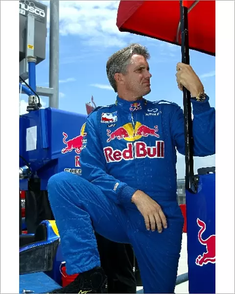 Indy Racing League: Eddie Cheever watches morning practice for the Firestone Indy 200, Nashville Indy 200, Nashville Speedway, Nashville, TN, 19, July, 2002