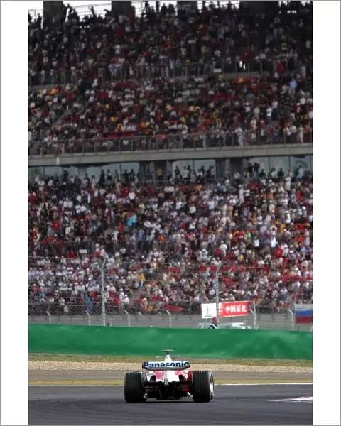 Formula One World Championship: A Toyota TF104B in action