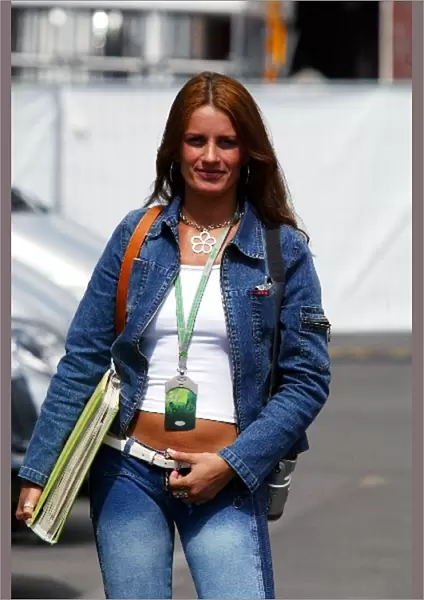 Formula One World Championship: A woman in the paddock