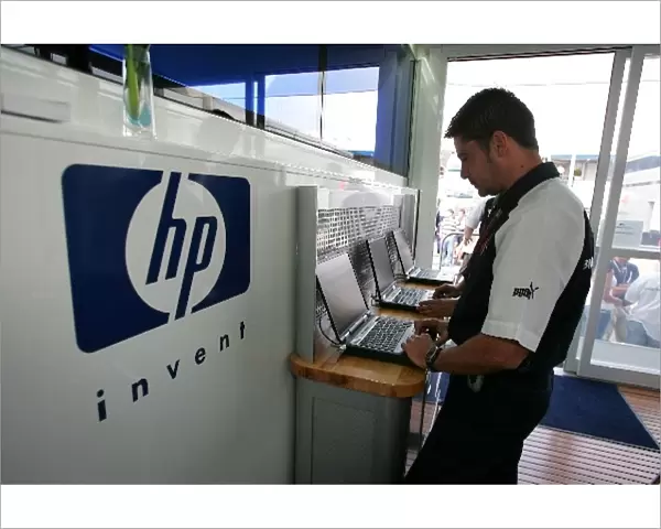 Formula One World Championship: HP Techicians at work in the Williams Motorhome