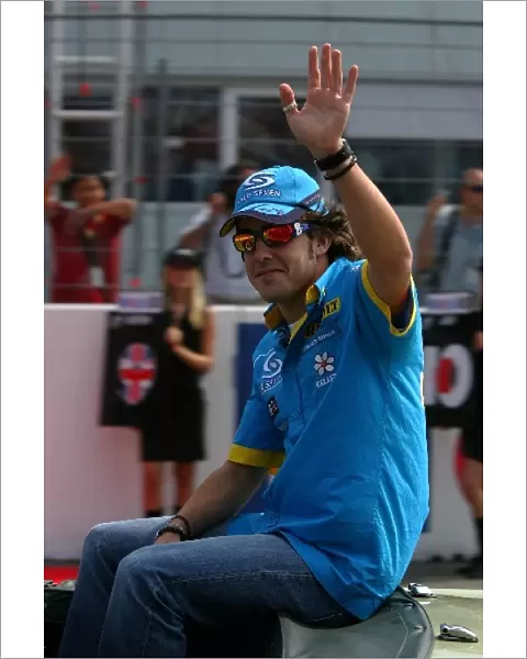 Formula One World Championship: Fernando Alonso waves to the crowd