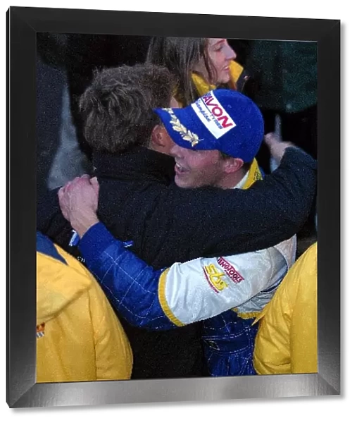 British Formula Ford Festival: Jan Heylen celebrates with team members after winning the 2002 Formula Ford Festival