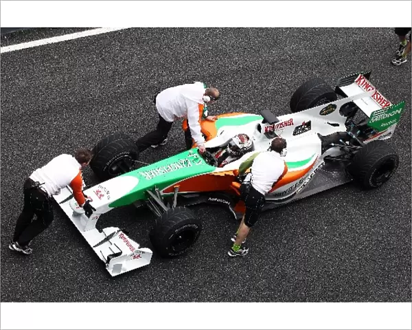 Formula One World Championship: Force India F1 Team mechanics come to the aid of Adrian Sutil Force India F1 VJM03, who has stopped at the end