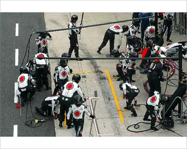 Formula One World Championship: The BAR team await a pitstop