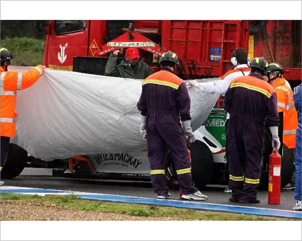 Formula One World Championship: The Force India F1 VJM03 is recovered to the pits after stopping on the circuit