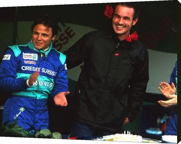 Formula One Testing: Felipe Massa and Nick Heidfeld celebrate Sauber Team manager Beat Zehnders Birthday