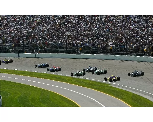 Close racing into the first turn of the race: Indianapolis 500, Indianapolis, USA, 26 May 2002