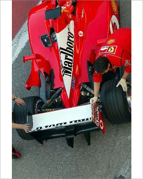 Formula One Testing: Michael Schumacher Ferrari F2002 is pushed back into his garage