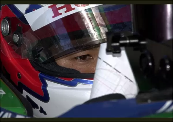 Shinji Nakano studies the time sheet during qualifying for the Molson Indy Montreal