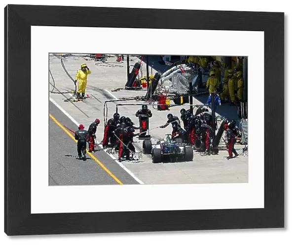 Formula One World Championship: Eighth placed Zsolt Baumgartner Minardi PS04B makes a pitstop