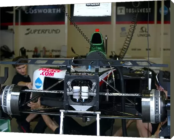 Formula One World Championship: Minardi Cosworth PS04B in the garage
