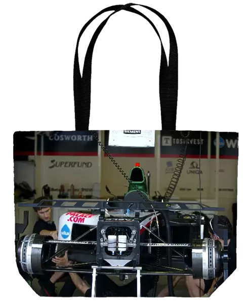 Formula One World Championship: Minardi Cosworth PS04B in the garage