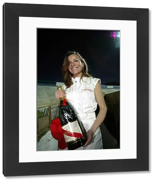 Formula One World Championship: A signed Champagne Mumm Jeroboam which has been signed by the drivers and Brazilians who played in the football match
