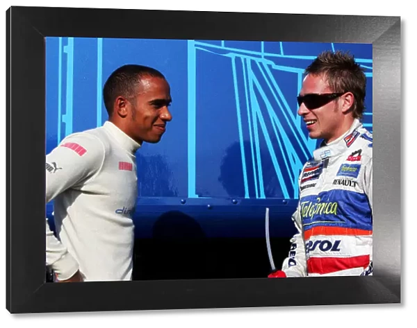 GP2. Adam Carroll (GBR) Racing Engineering talks with Lewis Hamilton (GBR)