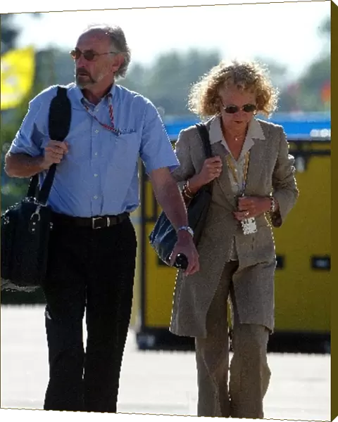 Formula One World Championship: Bernard Ferguson Cosworth Racing and his wife in the paddock