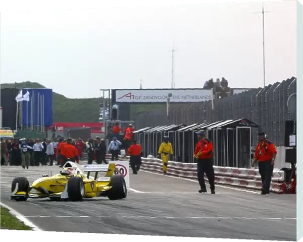 A1GP: Alex Yoong A1 Team Malaysia pulls into the end of the pitlane with suspension problems on lap 1