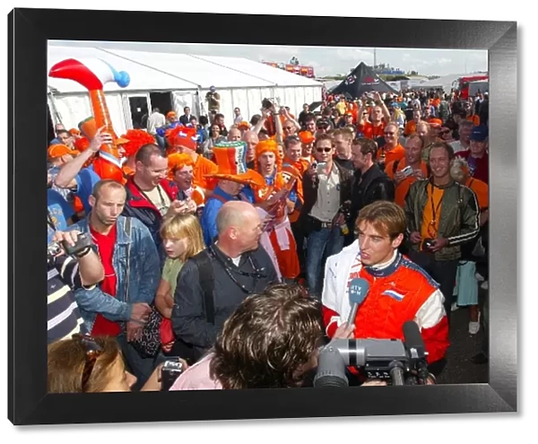 A1GP: Dutch fans salute Jeroen Bleekemolen A1 Team Netherlands as he does a TV interview