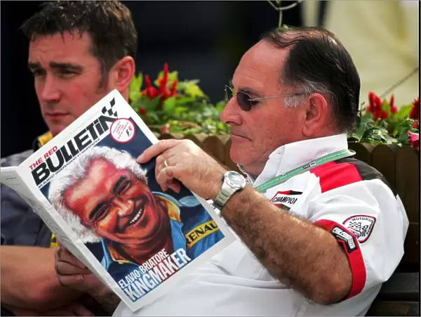 Formula One World Championship: Simon Arkless, Champion Spark Plugs reads Red Bulletin
