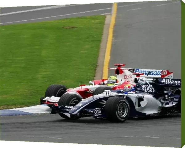 Formula One World Championship: Mark Webber Williams FW28 and Ralf Schumacher Toyota TF106 battle