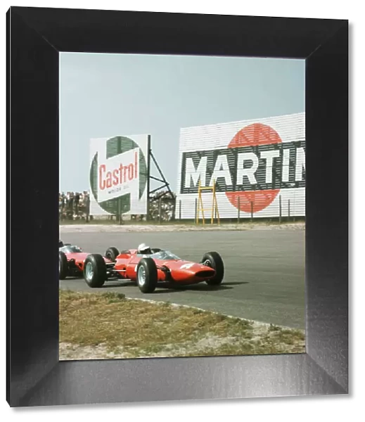 1964 Dutch Grand Prix. Zandvoort, Holland. 22-24 May 1964. Lorenzo Bandini (Ferrari 158) closely followed by Giancarlo Baghetti (BRM P57). Ref-1253. World Copyright - LAT Photographic